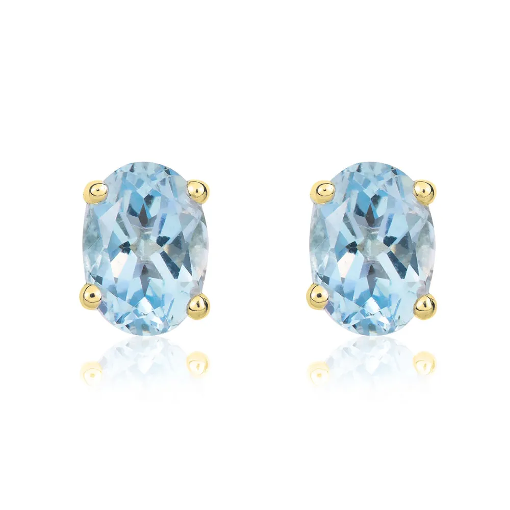9ct Yellow Gold Aquamarine 7x5mm Oval Claw Set Stud Earrings sold by Jura Watches