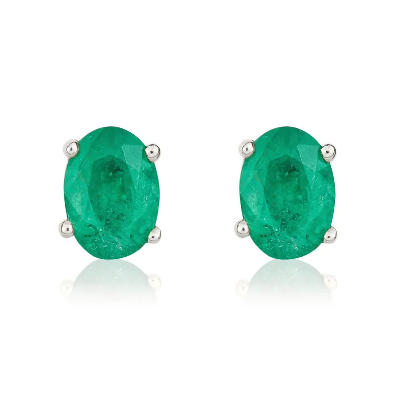 9ct White Gold Emerald 7x5mm Oval Claw Set Stud Earrings sold by Jura Watches