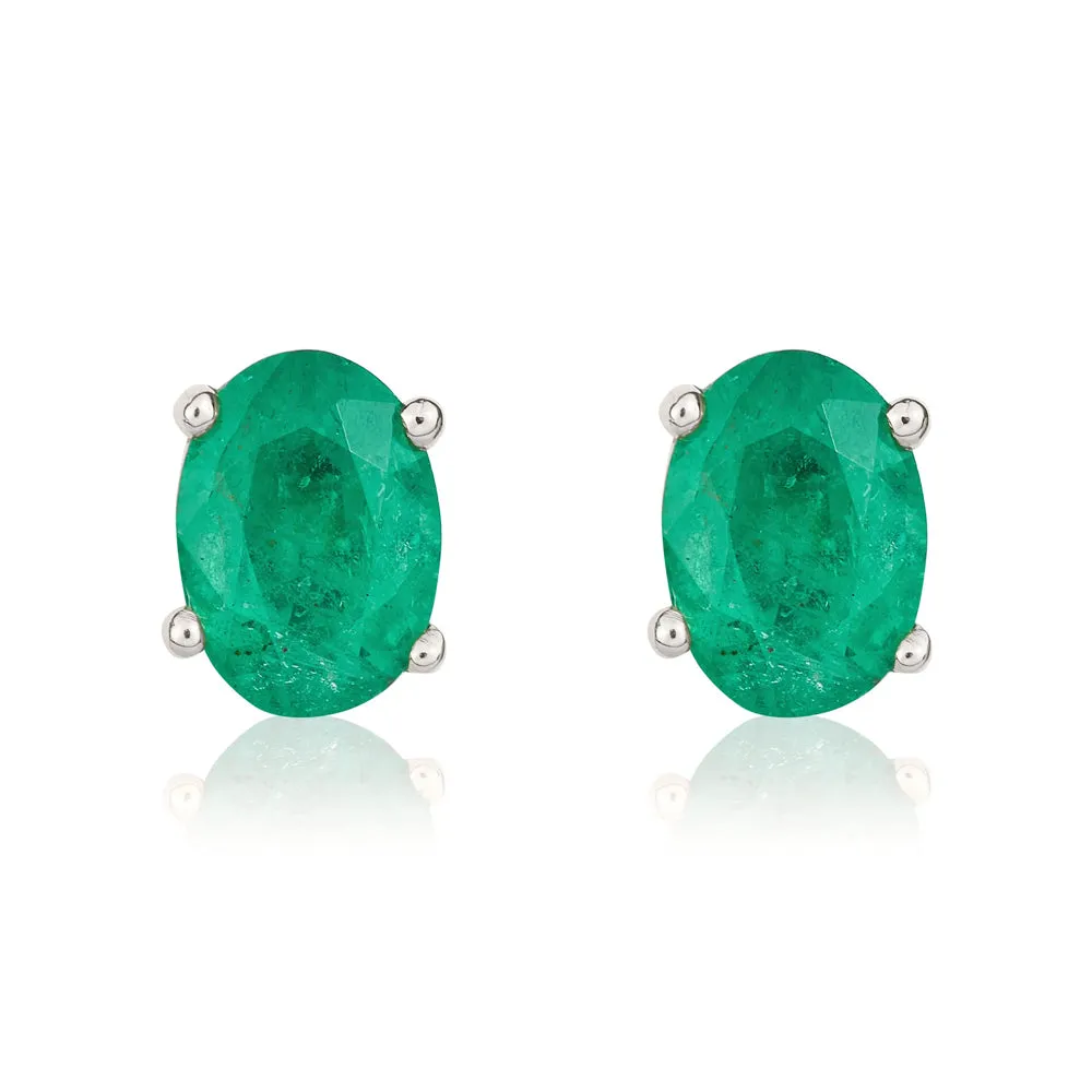 9ct White Gold Emerald 7x5mm Oval Claw Set Stud Earrings sold by Jura Watches