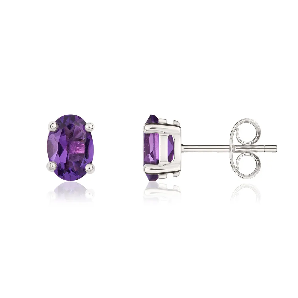 9ct White Gold Amethyst 7x5mm Oval Claw Set Stud Earrings sold by Jura Watches product image thumbnail 2