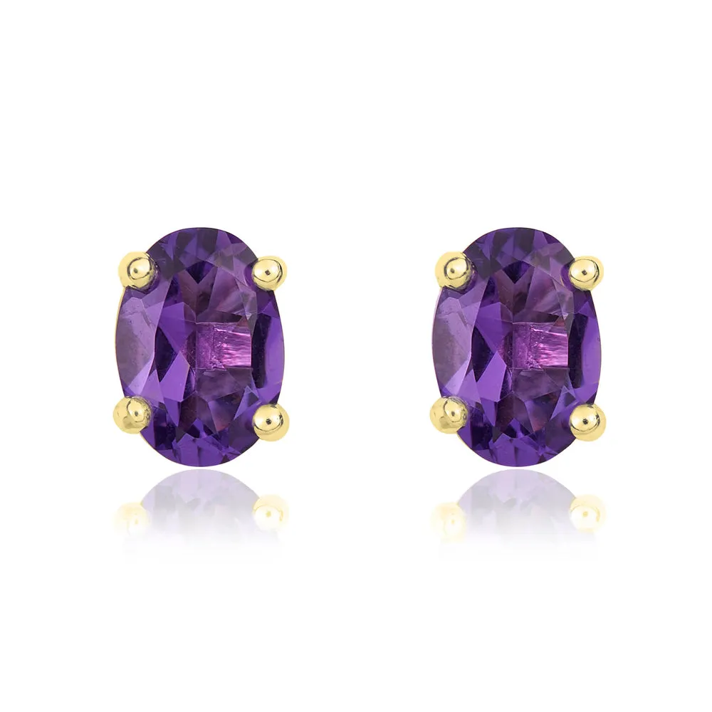 9ct Yellow Gold Amethyst 7x5mm Oval Claw Set Stud Earrings sold by Jura Watches