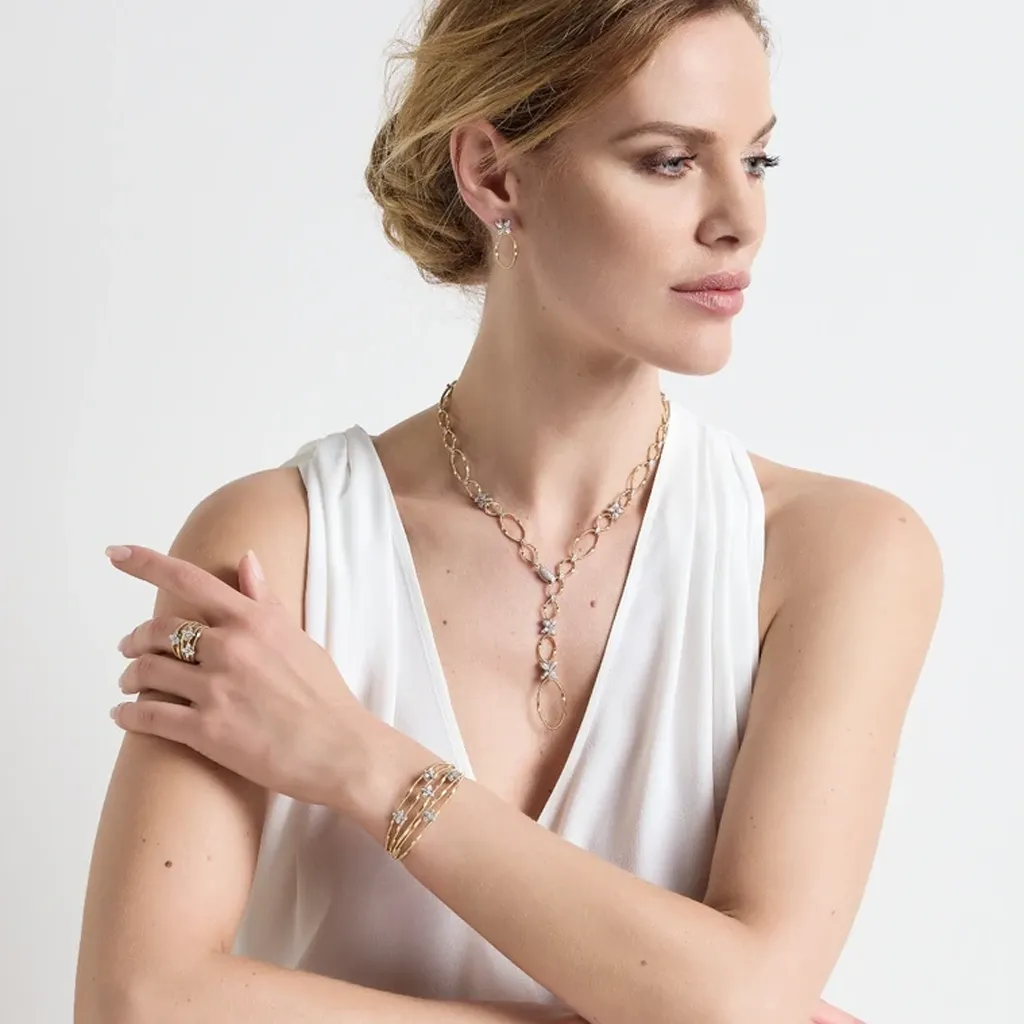 Marco Bicego Marrakech Onde 18ct Yellow Gold Diamond Flower Medium Bangle sold by Jura Watches product image thumbnail 2