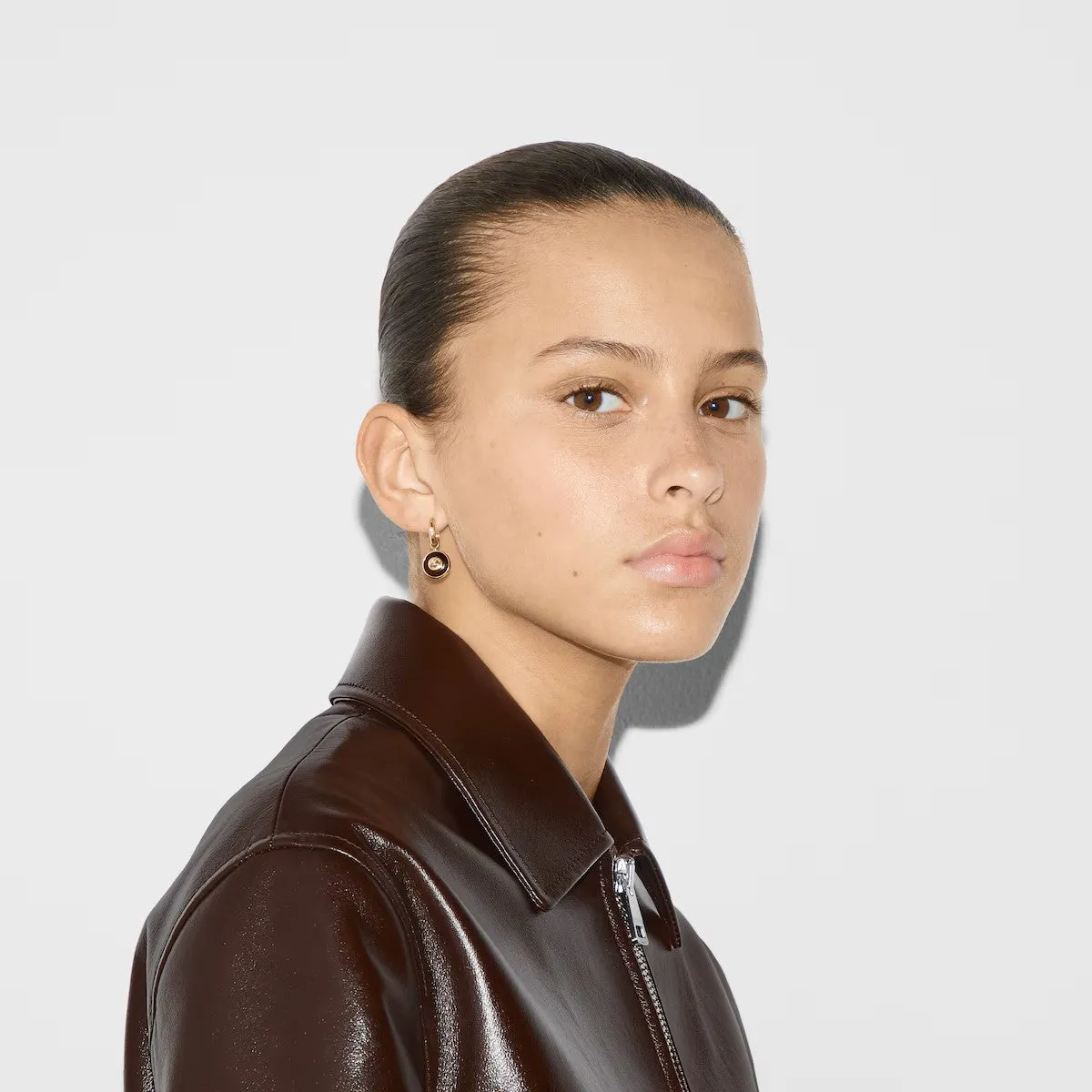 Gucci Interlocking 18ct Yellow Gold Black Onyx Hoop Earrings D sold by Jura Watches product image thumbnail 3