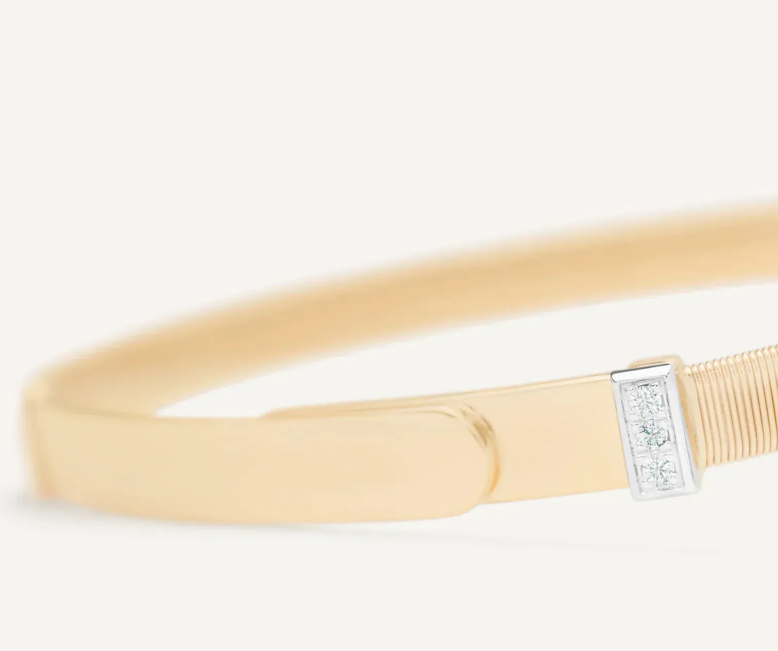 Marco Bicego Masai 18ct Yellow Gold Thin Coil 0.06ct Diamond Bangle sold by Jura Watches product image thumbnail 2