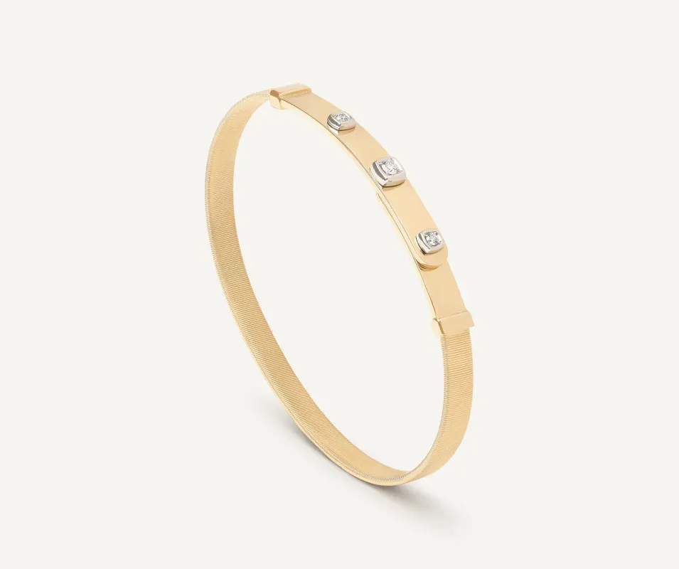 Marco Bicego Masai 18ct Yellow Gold Thin Coil 0.10ct Diamond Bangle sold by Jura Watches