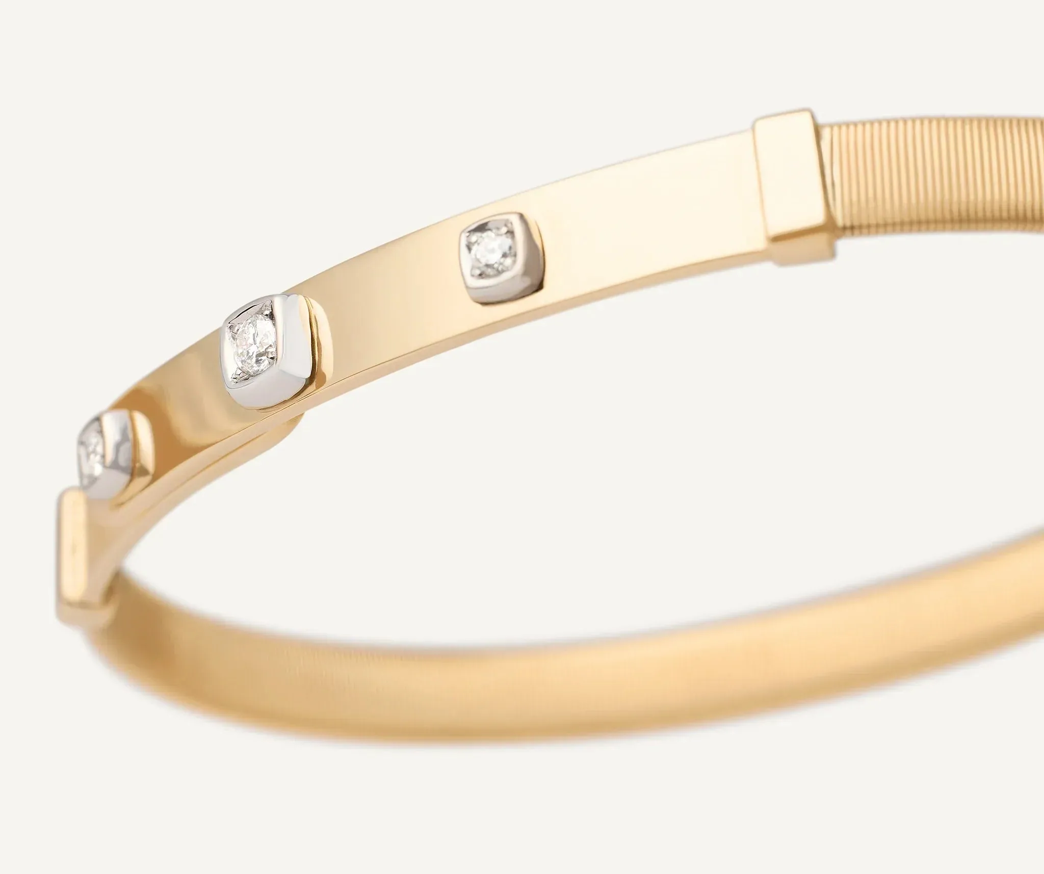 Marco Bicego Masai 18ct Yellow Gold Thin Coil 0.10ct Diamond Bangle sold by Jura Watches product image thumbnail 2
