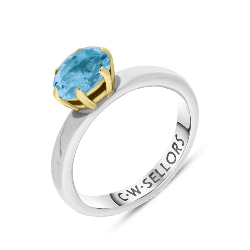 9ct Yellow Gold Sterling Silver Blue Topaz Stepping Stones 4x7mm Oval Claw Set Ring sold by Jura Watches