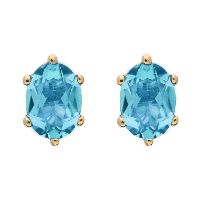 9ct Yellow Gold Sterling Silver Topaz Stepping Stones 4x7mm Oval Claw Set Stud Earrings sold by Jura Watches