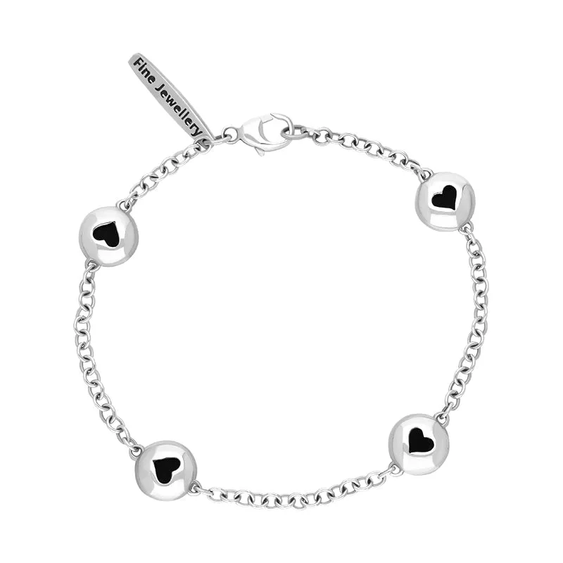 9ct White Gold Whitby Jet Oval Heart Detail Four Stone Bracelet sold by Jura Watches