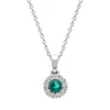 18ct White Gold Emerald Diamond Cluster Pendant sold by Jura Watches