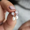 Queen Elizabeth II Pearl Earrings sold by Tru Diamonds