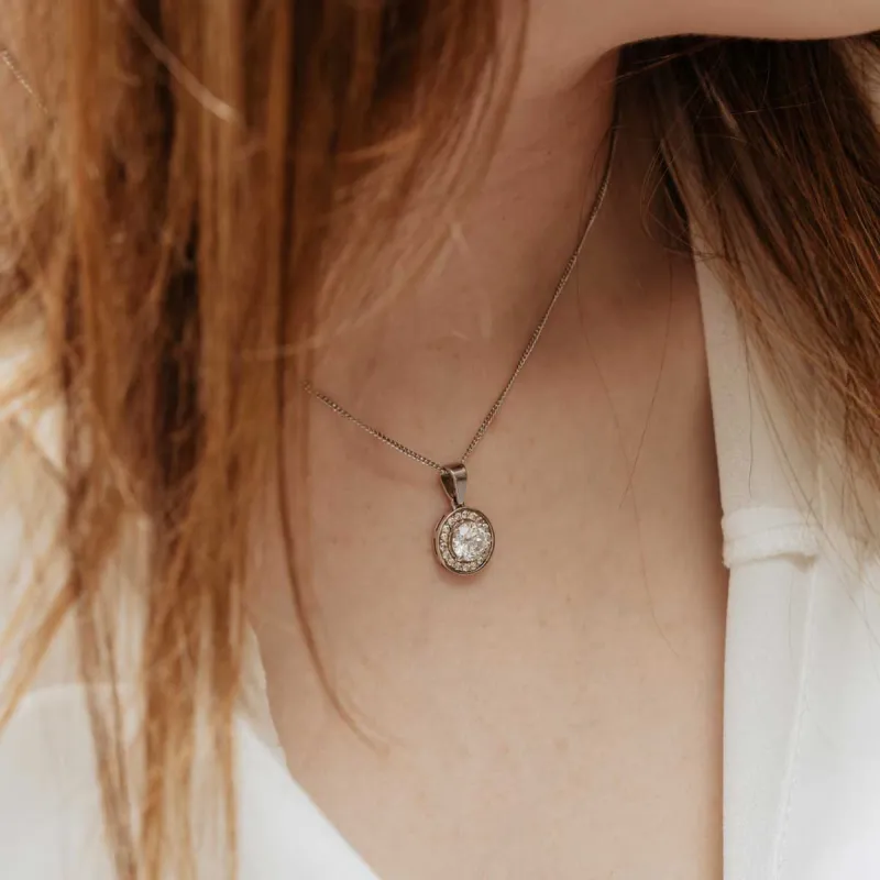 The Diana Pendant | 0.91ct D-E VVS1 Round Halo 9k White Gold sold by Ethica Diamonds