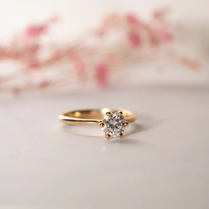 The Sissy Ring | Round Moissanite Petite Six Claw Engagement Solitaire sold by Ethica Diamonds