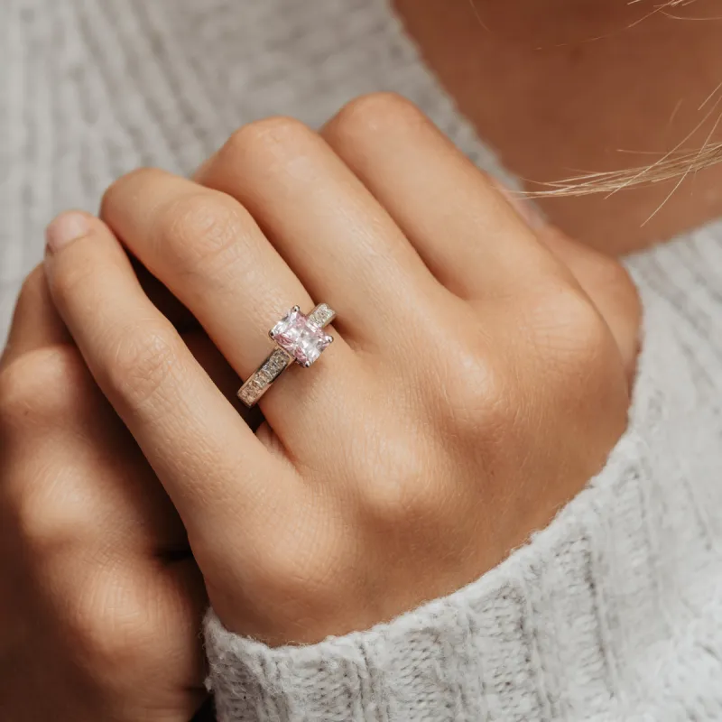 The Yasmin Ring | 2.39ct Emerald Radiant Fancy Pink Moissanite Shoulder Set 950 Palladium sold by Ethica Diamonds