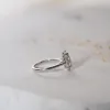 The Hala Ring | Moissanite & Diamond Pear Cut Engagement Halo sold by Ethica Diamonds