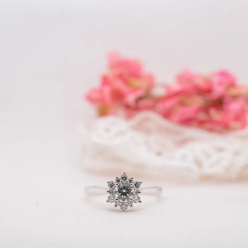 The Violet Ring | Moissanite & Diamond Floral Vintage Engagement Halo sold by Ethica Diamonds