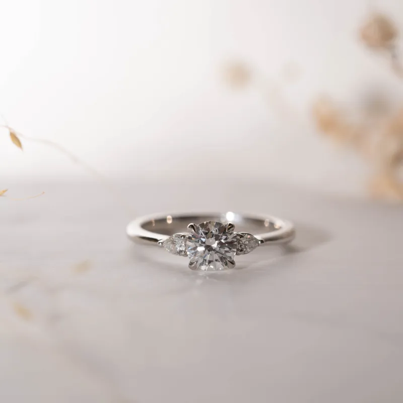 The Mei Ring | Round & Pear Lab Diamond Engagement Trilogy sold by Ethica Diamonds