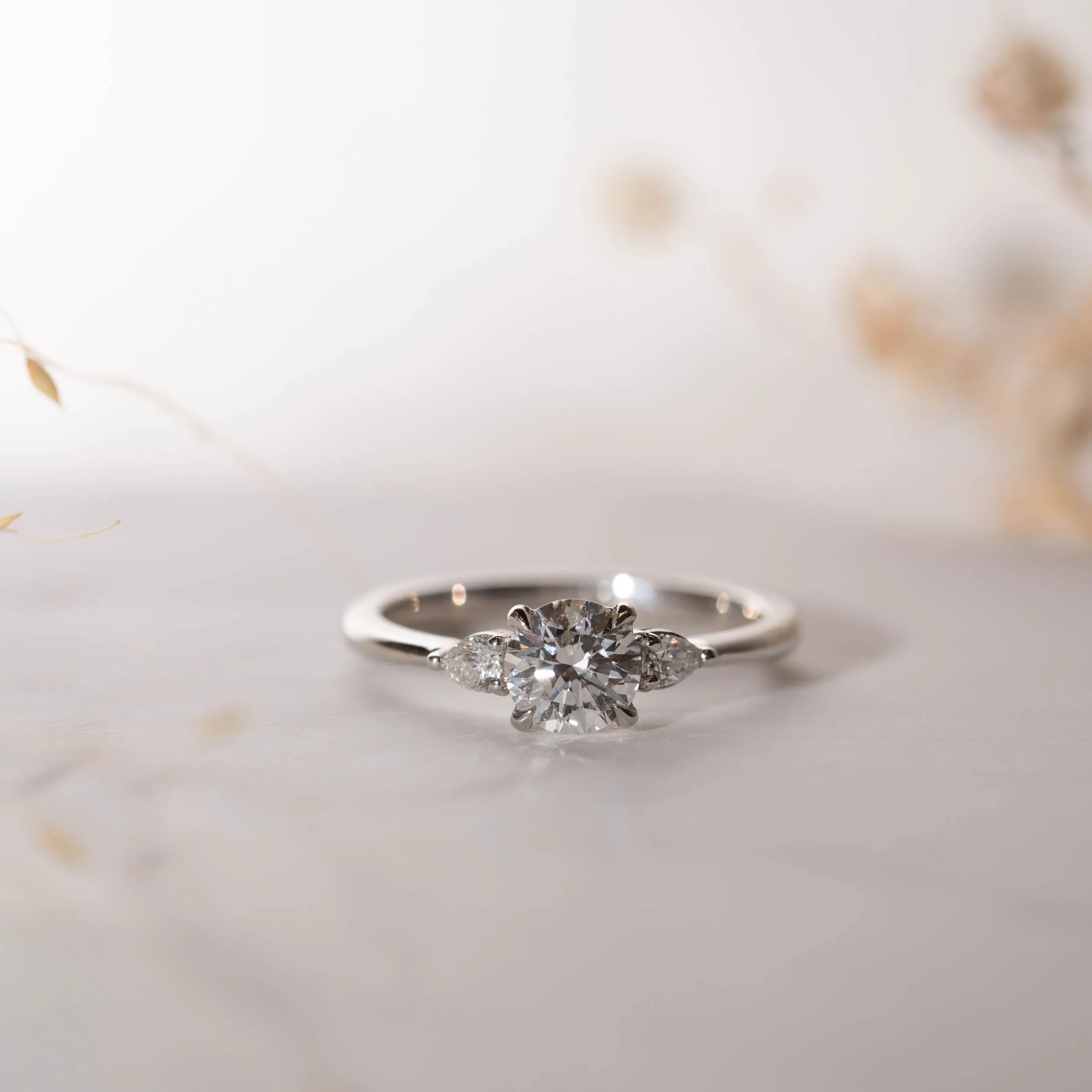 The Mei Ring | Round & Pear Lab Diamond Engagement Trilogy sold by Ethica Diamonds