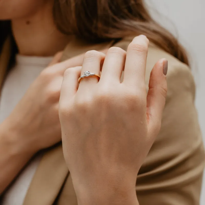 The Scarlett Ring | Moissanite Round & Baguette Accented Trilogy sold by Ethica Diamonds