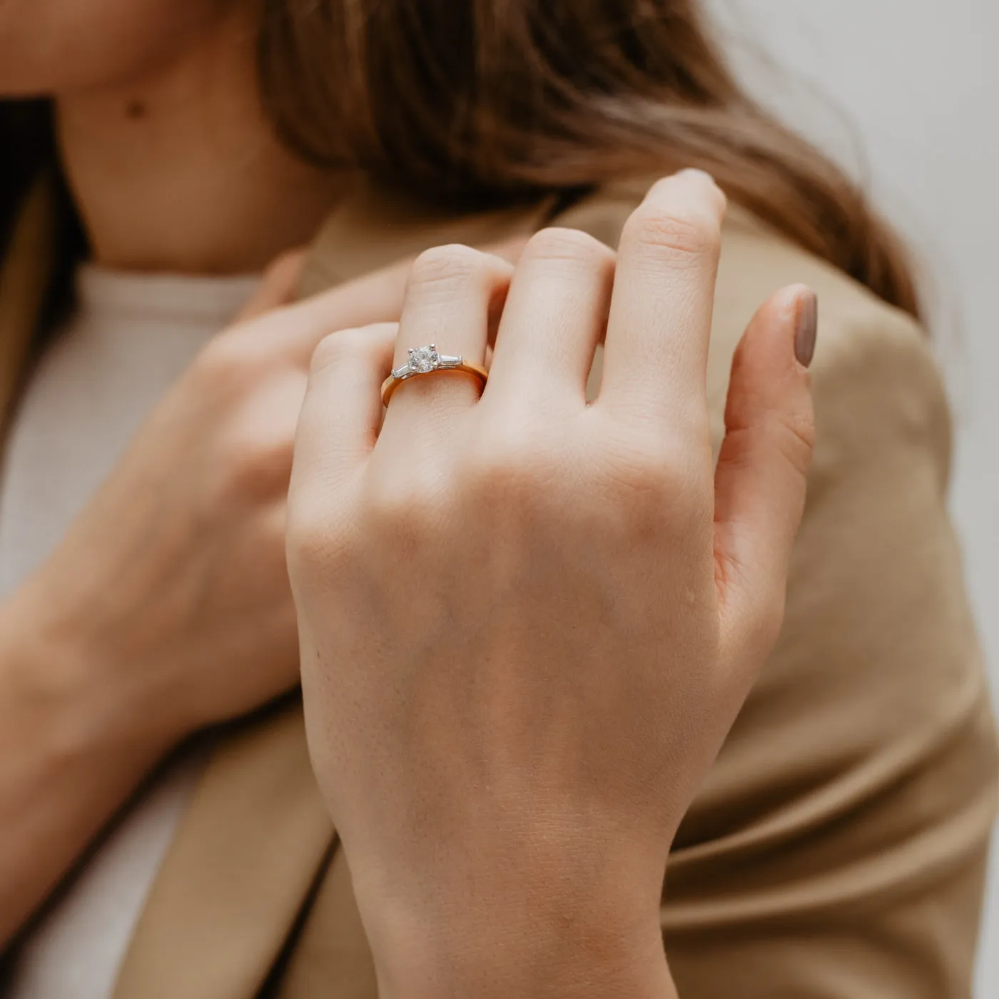 The Scarlett Ring | Moissanite Round & Baguette Accented Trilogy sold by Ethica Diamonds