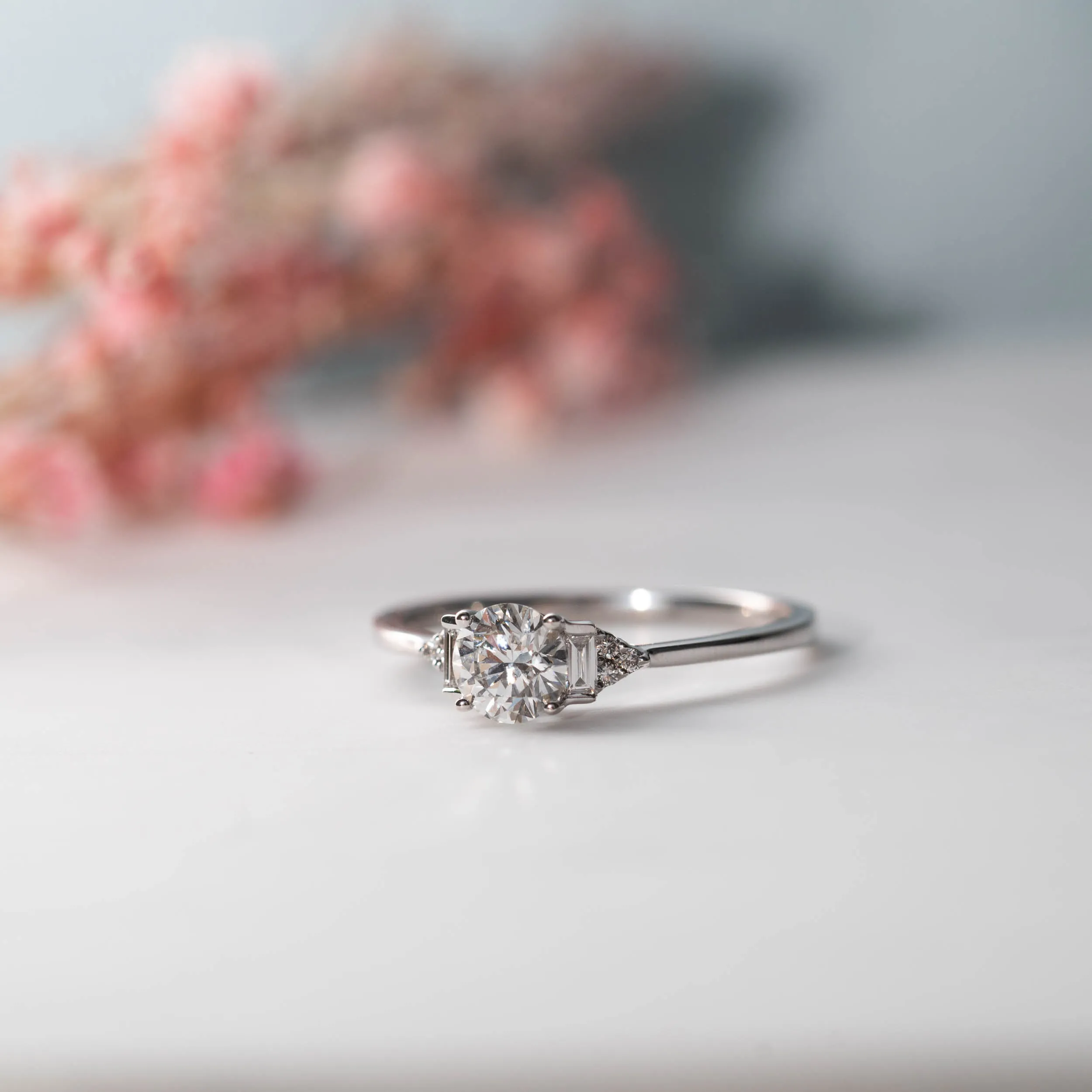 The Abi Ring | Round Lab Diamond Baguette Accented Engagement sold by Ethica Diamonds