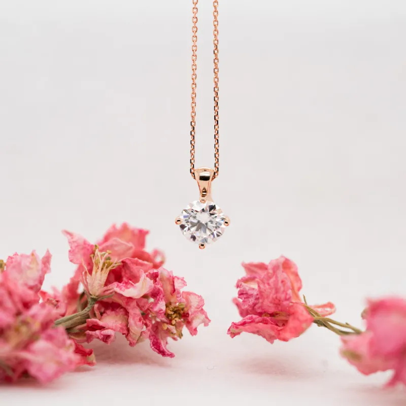 The Aria Pendant | Round Moissanite Twist Four Claw Solitaire sold by Ethica Diamonds