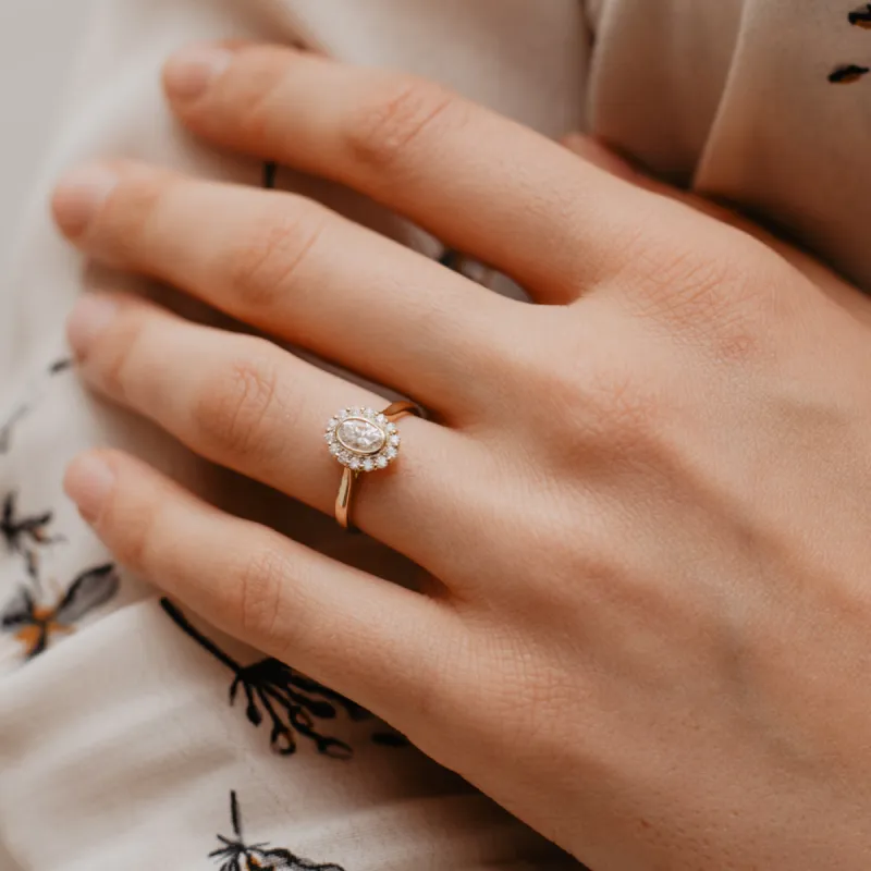 The Lenore Ring | Moissanite & Diamond Oval Cut Engagement Halo sold by Ethica Diamonds