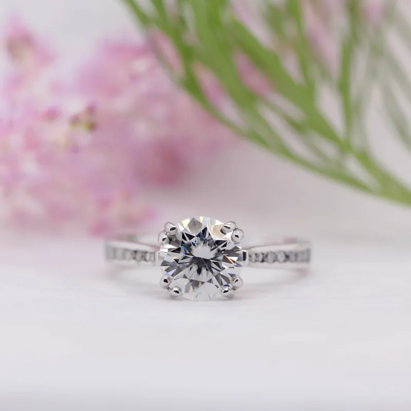 The Irene Ring | Round Cut Moissanite & Diamond Channel Set Engagement sold by Ethica Diamonds