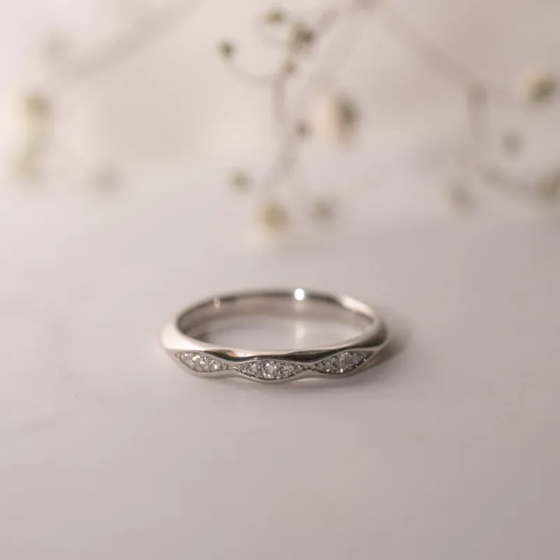 The Celia Wedding Ring | Lab Diamond Grain Set Wave Band sold by Ethica Diamonds