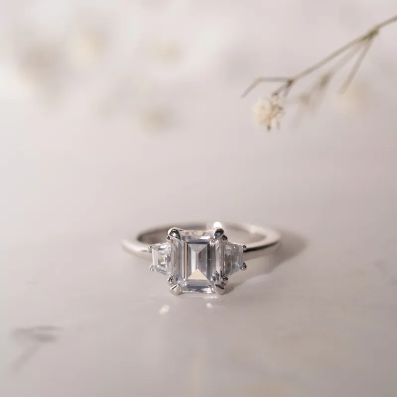 The Evelyn Ring | Lab Diamond Emerald & Trapezoid Cut Engagement Trilogy sold by Ethica Diamonds