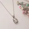 The Calia Pendant | Oval Moissanite Four Claw Solitaire sold by Ethica Diamonds