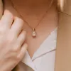 The Calia Pendant | Oval Moissanite Four Claw Solitaire sold by Ethica Diamonds