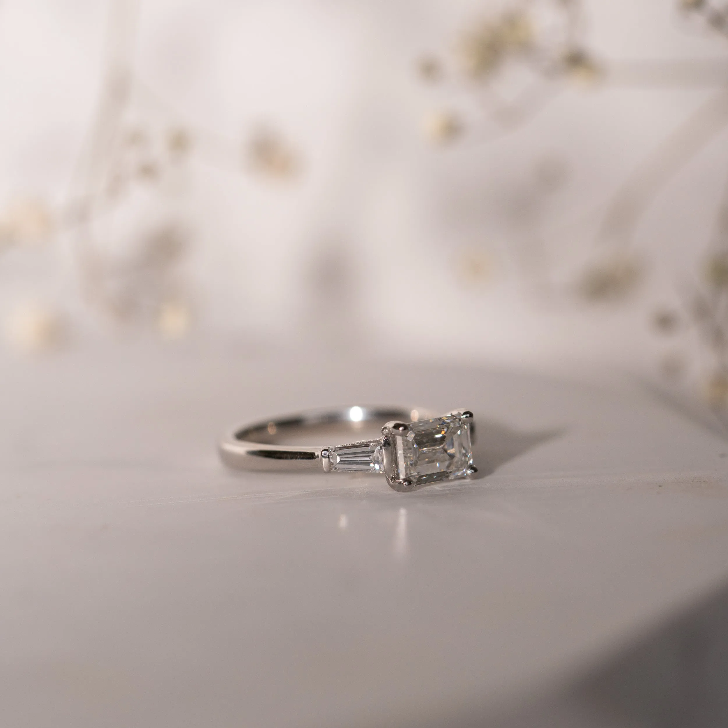 The Eden Ring | Moissanite Emerald & Baguette Engagement Trilogy sold by Ethica Diamonds product image thumbnail 5