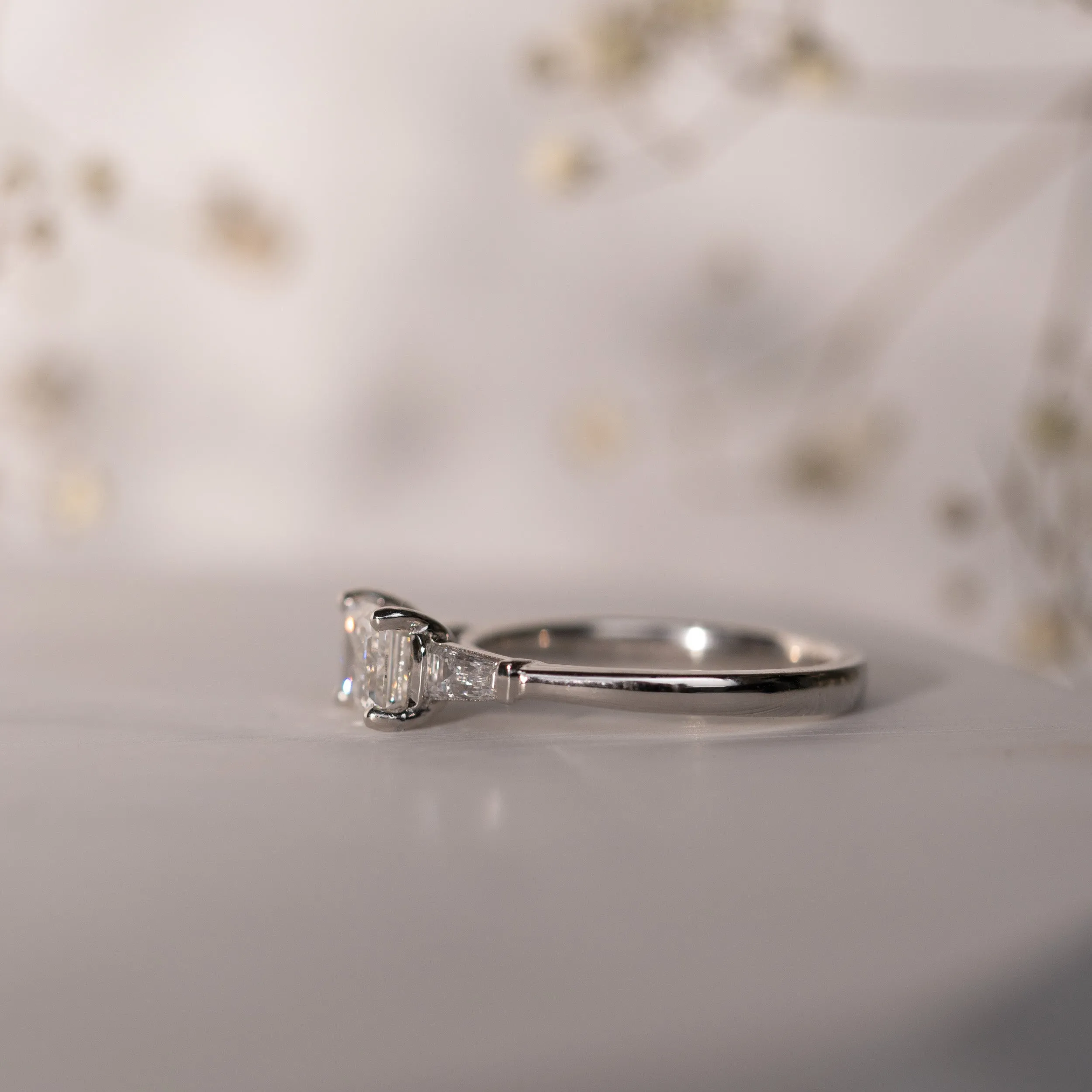 The Eden Ring | Moissanite Emerald & Baguette Engagement Trilogy sold by Ethica Diamonds product image thumbnail 4