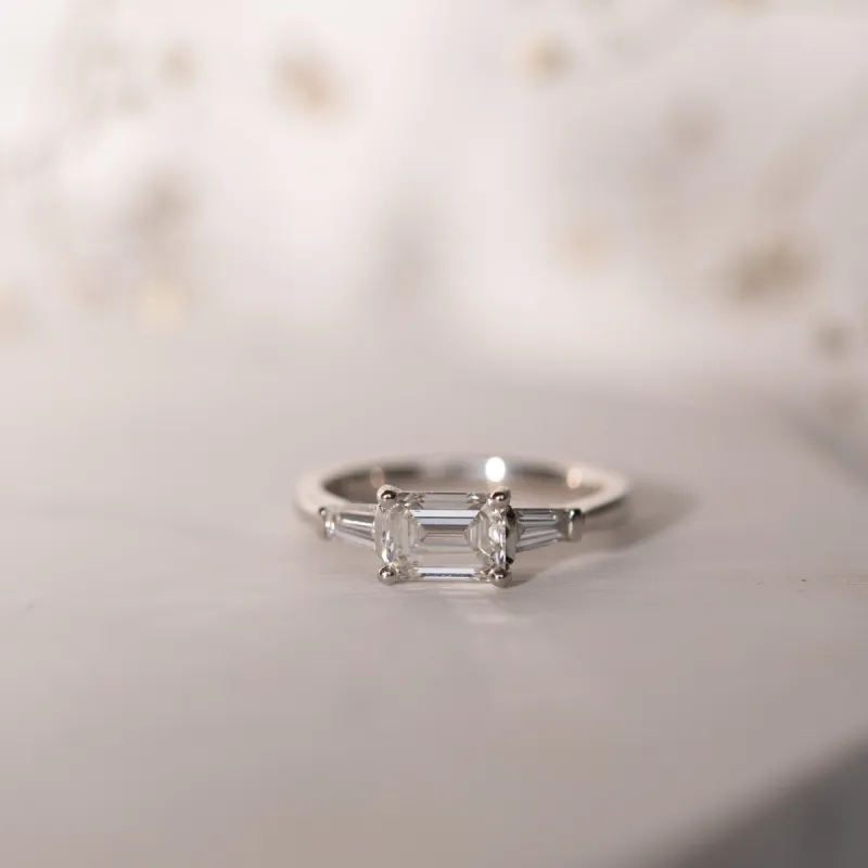 The Eden Ring | Moissanite Emerald & Baguette Engagement Trilogy sold by Ethica Diamonds