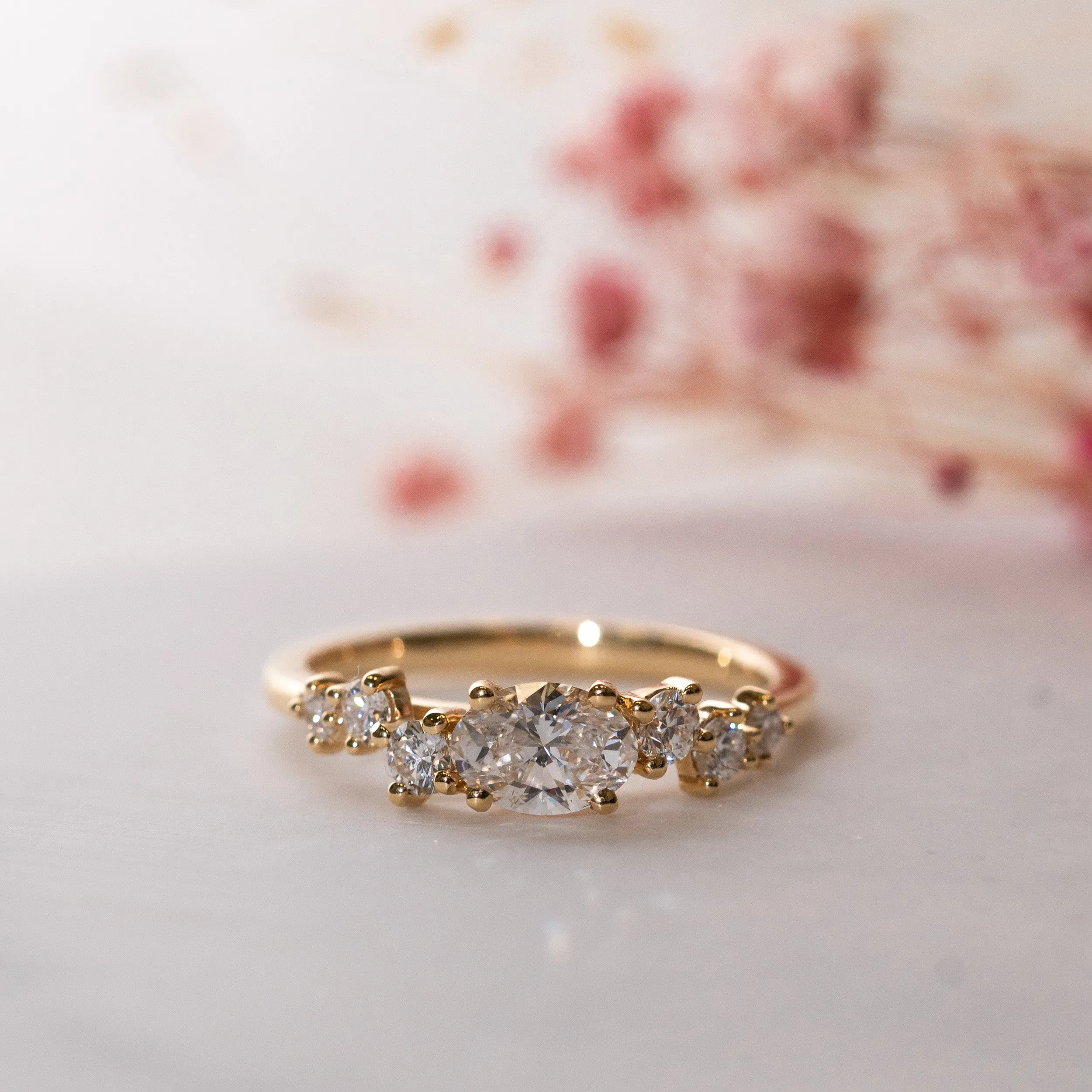 The Sophie Ring | Oval Lab Diamond Accented Engagement East-West Set sold by Ethica Diamonds