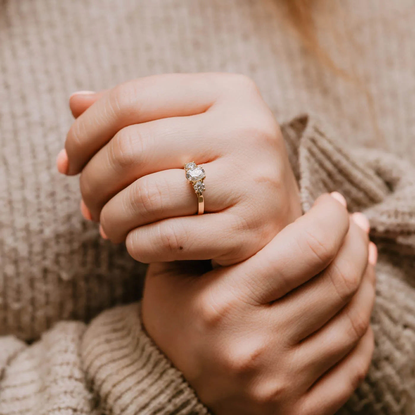 The Tessa Ring | Moissanite Oval & Round Graduated Engagement Trilogy sold by Ethica Diamonds product image thumbnail 5