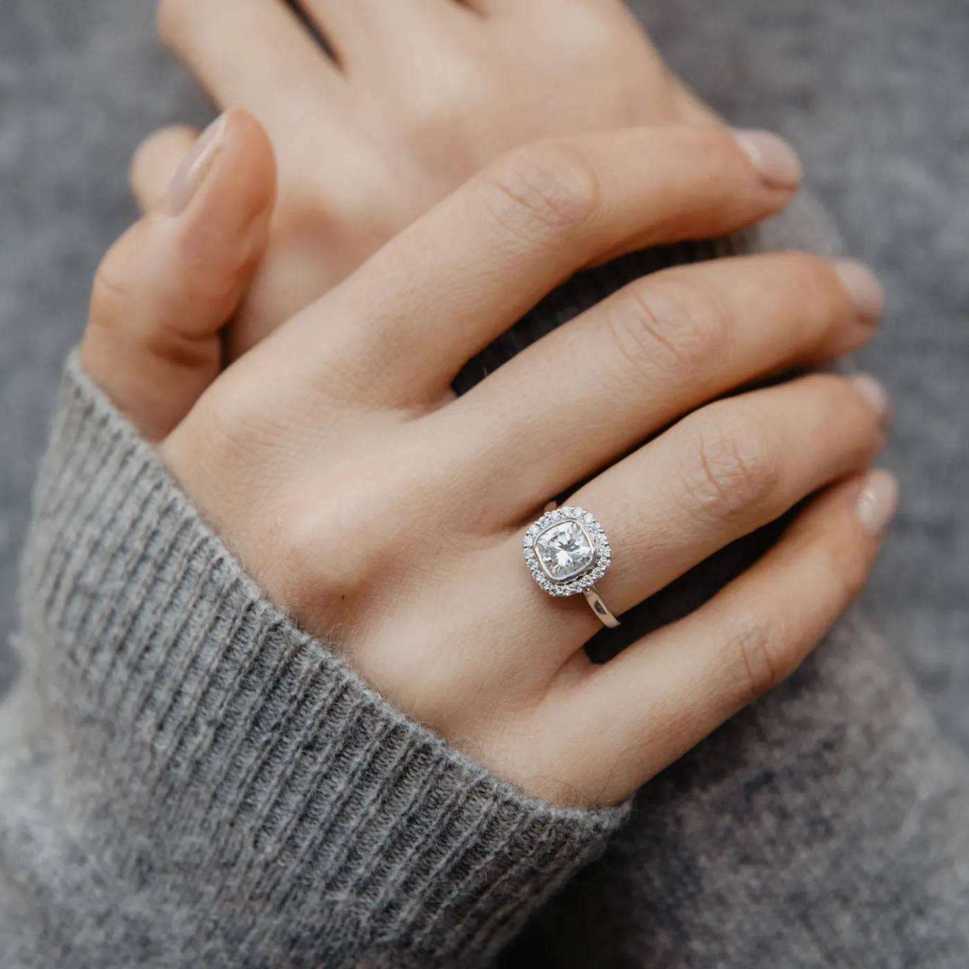 The Lovina Ring | Moissanite & Diamond Cushion Cut Engagement Halo sold by Ethica Diamonds