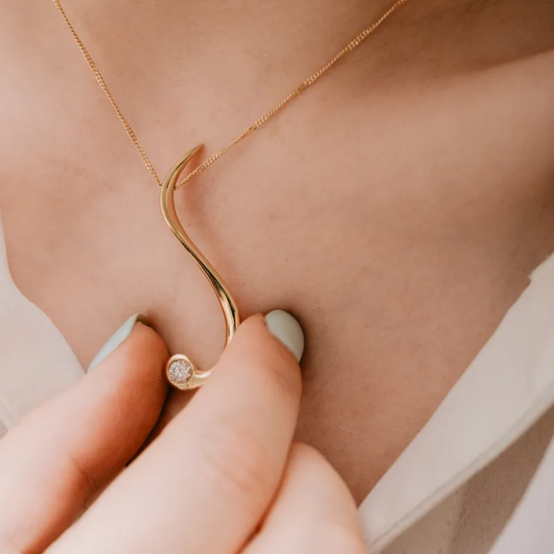 The Elowen Pendant | Round Moissanite Pirouette Solitaire sold by Ethica Diamonds