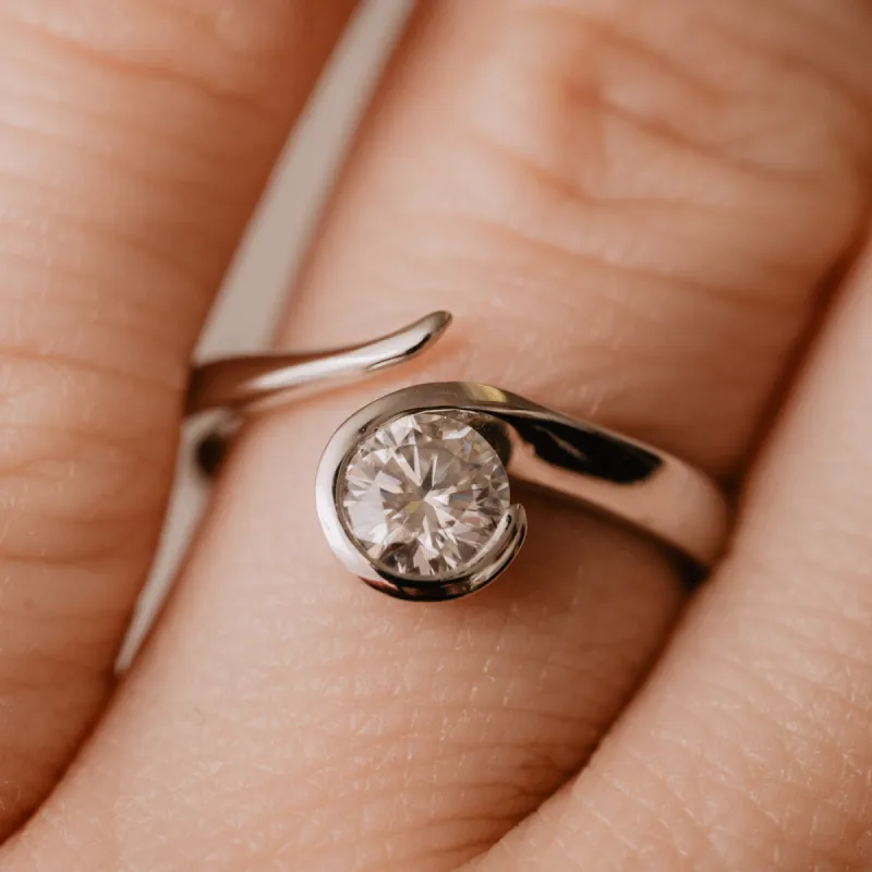 The Sidonie Ring | Round Moissanite Contemporary Wave Solitaire Engagement sold by Ethica Diamonds