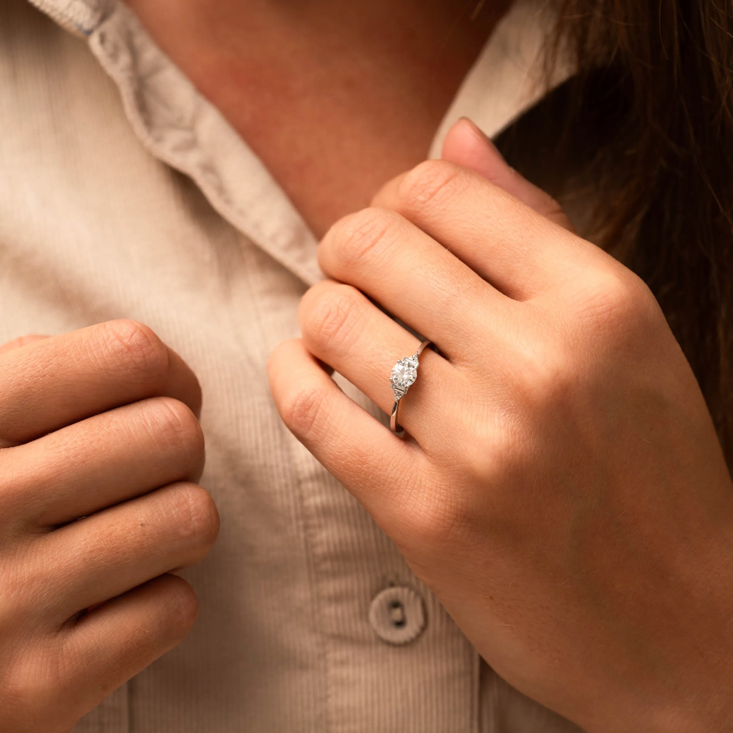 The Abi Ring | Round Moissanite & Diamond Baguette Accented Engagement sold by Ethica Diamonds product image thumbnail 4