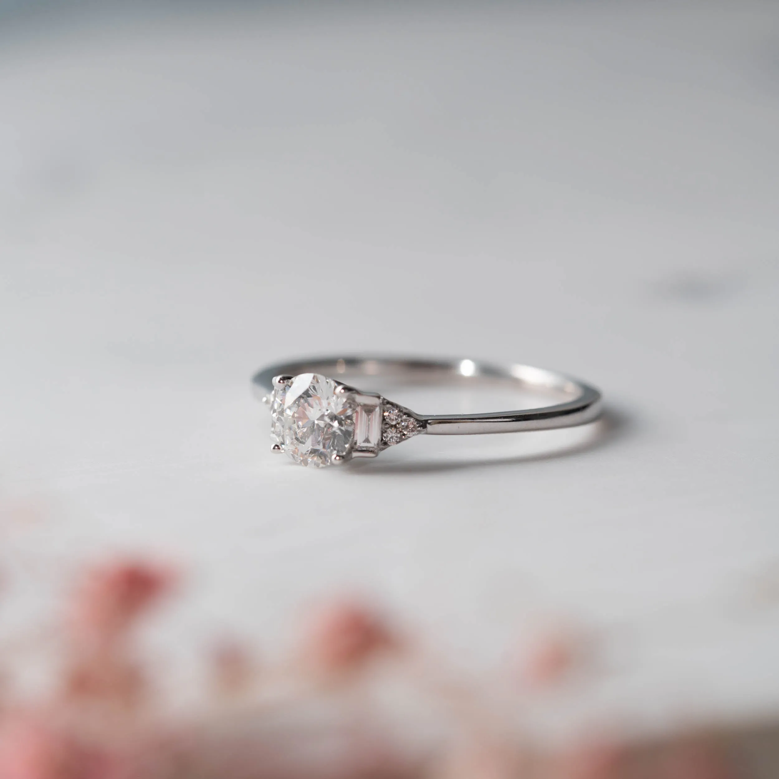 The Abi Ring | Round Moissanite & Diamond Baguette Accented Engagement sold by Ethica Diamonds product image thumbnail 3