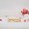 The Evangeline Ring | Round Moissanite & Diamond Vintage Engagement Solitaire sold by Ethica Diamonds