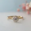 The Posey Ring | Moissanite & Diamond Floral Engagement Halo sold by Ethica Diamonds