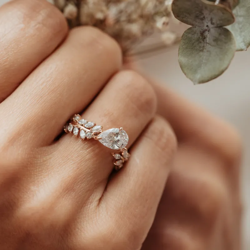 The Jaima Ring | Pear Moissanite & Diamond Leaf Accented Cut Statement sold by Ethica Diamonds