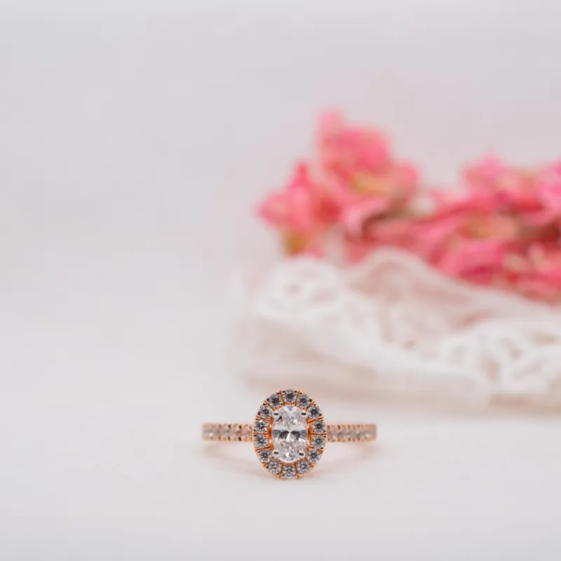 The Hila Ring | Moissanite & Diamond Oval Shoulder Set Engagement Halo sold by Ethica Diamonds