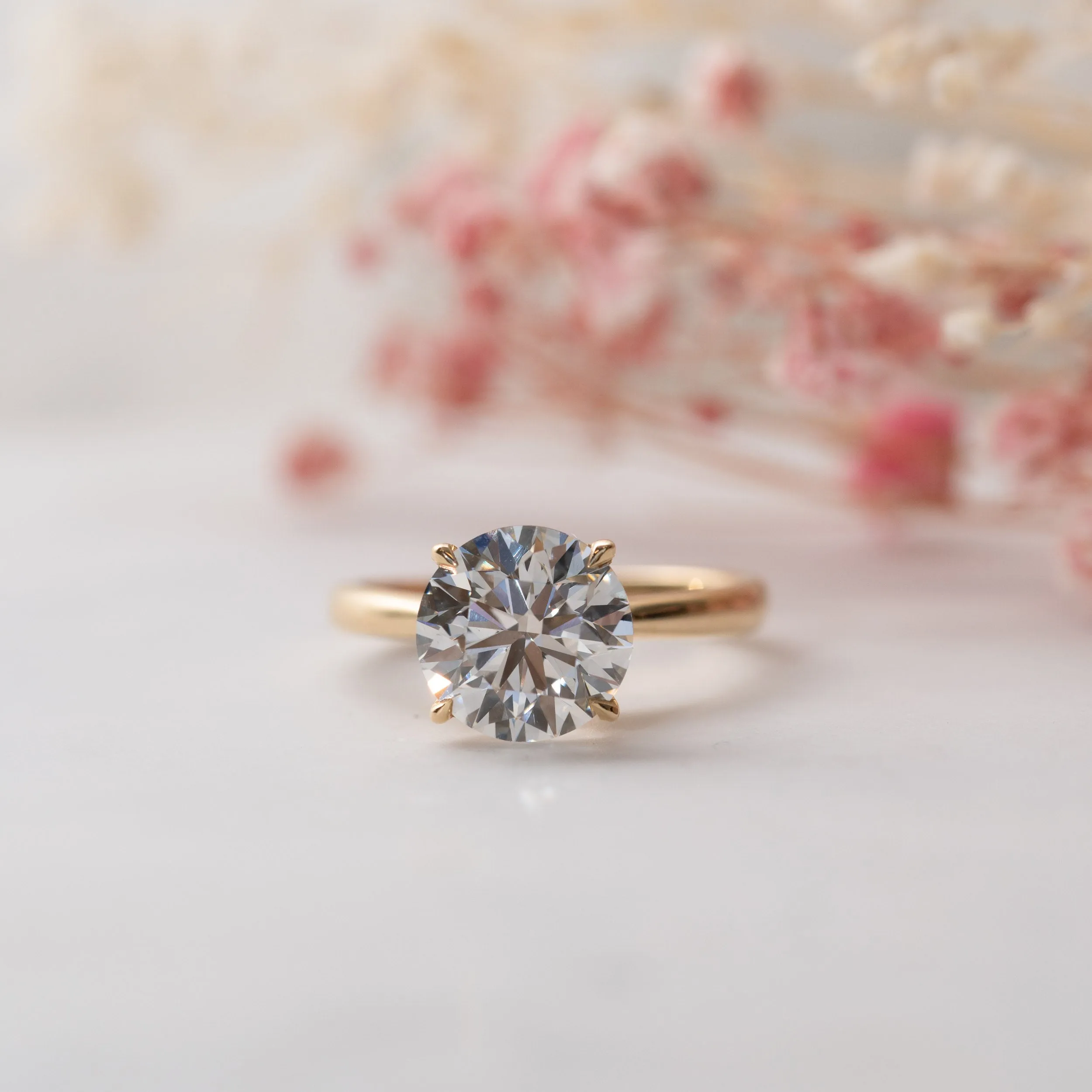 The Adeline Ring | Round Lab Diamond Tiffany Engagement Solitaire sold by Ethica Diamonds