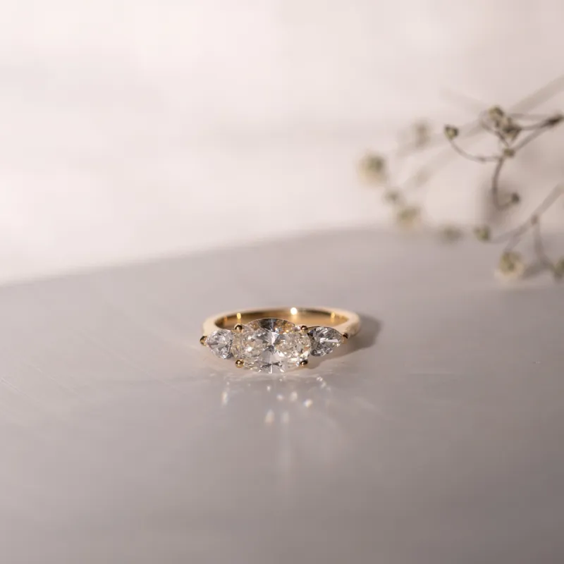The Claire Ring | Moissanite Oval & Pear Cut Engagement Trilogy sold by Ethica Diamonds