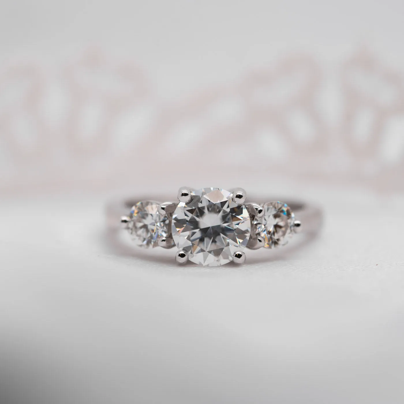 The Adora Ring | Moissanite Classic Round Cut Trilogy Engagement sold by Ethica Diamonds product image thumbnail 2