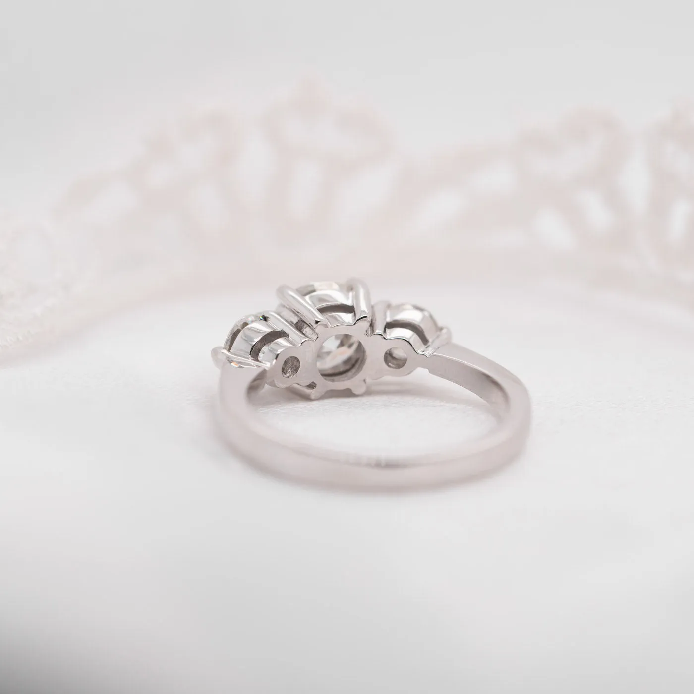 The Adora Ring | Moissanite Classic Round Cut Trilogy Engagement sold by Ethica Diamonds product image thumbnail 4